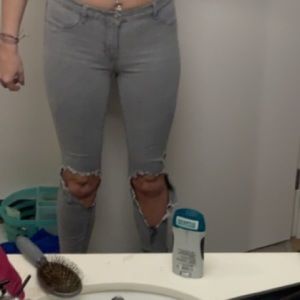 Jeans Grey ripped knee holes- frayed at the bottom